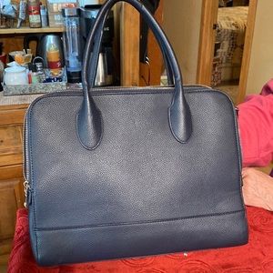 Urban expression tote 3 large sections.  2 zippered one snap navy blue